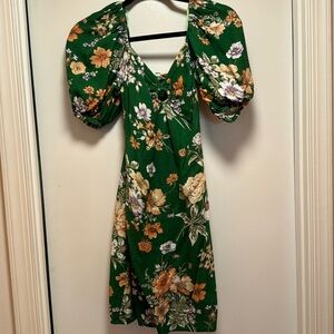 Small floral green dress with circle accent